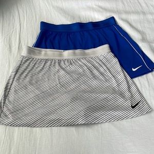 2 like new medium Nike Women’s tennis skirts